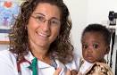 Dr. Cassandra Johnson with young patient - caring_kids_510