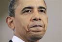 President Barack Obama pauses