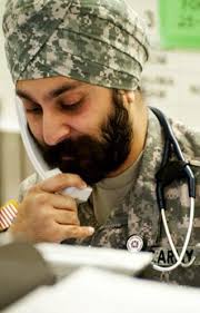 Sikh-American Maj Kamaljeet Singh Kalsi. by JOHN RAMSEY. At an Army post known for its red-capped paratroopers and green beret ... - Kalsi1-b