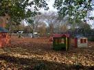 These colourful play houses among the autumn leaves contrast with the - via Daymix