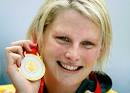 Photos: Australia's Leisel Jones wins Women's 100m Breaststroke gold - Img214531923