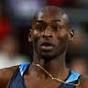 USA's Bernard Lagat and Ethiopia's Tariku Bekele compete in the 3000m heat