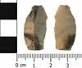 A black chert bladelet which appears to be burinated by a single blow on the - via Daymix