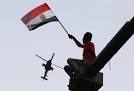 Bomb wounds two policemen on anniversary of Egypt uprising | Reuters