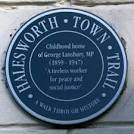 Plaque on home of George - via Daymix