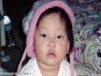 Grace Yoon, 15 months, was killed after a military jet crashed into her home ... - art.yoon2.cnn