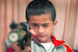 Surya Pratap Singh of AP School, Rohru, takes an aim during a shooting ... - him3