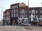 Shopping parade at the Ace of Spades roundabout on the Kingston By-Pass. - via Daymix