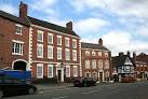 Welsh Row has an eclectic mixture of Georgian townhouses and black-and-white - via Daymix