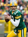 Photo: Aaron Rodgers Sips On Some Purple Soda Post GameGeeks and Cleats