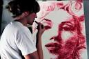 Artist creates awesome portraits painting with her lips     Lost At