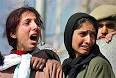 Unidentified relatives of Shabbir Ahmad Wani mourn during his funeral at ... - jk