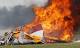 PILOT, STUNT WALKER KILLED IN PLANE CRASH AT OHIO AIR SHOW