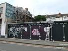 Artist at work at the Peoples Republic of Stokes Croft - via Daymix