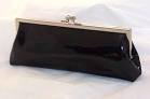 http://www.isabellas-handbag-shop.com/ekmps/shops/juliew/images/black-patent-clutch-bag-90625-4847-p.jpg