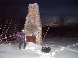 Karin Averbeck at the chimney. At the chimney, turn left and follow along the rim of ... - chimney.clark's.gully