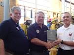 Robertson and Woolfolk recieve award from Mike Penaluna compress ...