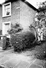 in stock brick with bold stucco trimming and have hipped slate roof. - via Daymix