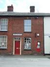The village Post Office in Bures, Suffolk with the best parking space - via Daymix