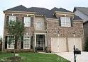 Stock Photo: Brown and Tan Brick House