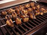Grilling beef meat public - via Daymix