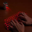 ThinkGeek :: Cube Laser Virtual Keyboard for iPad & iPhone