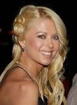 Tara Reid clarifies identity