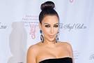 http://cdn.sheknows.com/articles/2012/03/kim-kardashian-top-knot.jpg