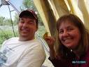 Nina and John holding a yellow