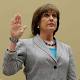 IRS official refuses to answer questions at scandal hearing - Reuters