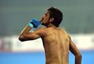 Pak hockey players remove shirt, make obscene gestures at crowd.