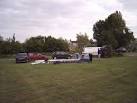 Tent erection. Campers at the campsite behind Pepperdale Farm near Brandy - via Daymix