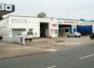 On the left is Pee Gee Motorcycles. On the right is Castle Discount Tyres. - via Daymix