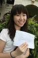 Top scorer Chui Yee is all smiles as she shows off her results. - manmeet2