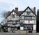 huge banners about television and breakfasts across this listed building - via Daymix