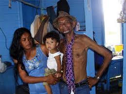 Habeeb Khan and his wife Doris with her grandson at their Friendship home - Habeeb1