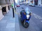 Electric vehicle charging point outside the Royal National Institute, - via Daymix