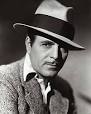 http://upload.wikimedia.org/wikipedia/en/thumb/2/28/Warner_Baxter.jpg/220px-Warner_Baxter.jpg