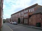 Former textile mill converted to business units and apartments. - via Daymix