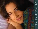 Balan made her acting debut in