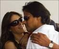 Indian businessman Arun Nayar (R) walks with his wife Elizabeth Hurley and ...