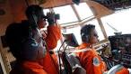 Bad weather wreaks havoc on search for victims of AirAsia flight.