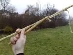 An attempt at throwing spears with a baton and cord in World