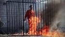 BREAKING: ISIS Burned Jordanian Pilot Alive In a Cage ��� PHOTOS.