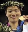 ... displays her gold medal after defeating Myriam Baverel, from France, ... - xin_51080130141822507731
