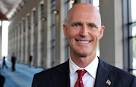 Rick Scott is touring Spain on