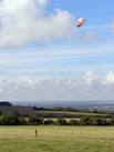 The large grassy area on the Ridgeway between the "White Horse" car park and - via Daymix