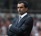 Roberto Martinez in suit