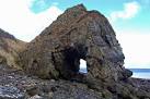 It is holed right through by a cave in such a way that the origin of its - via Daymix