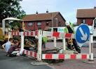 Local boys supervise the fitting of a replacement water main to houses on - via Daymix